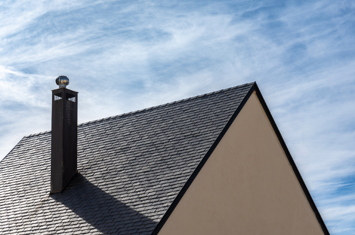 a roof with natural slate tiles
