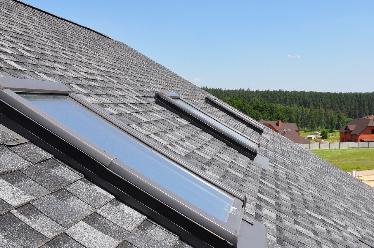 a roof with three skylights
